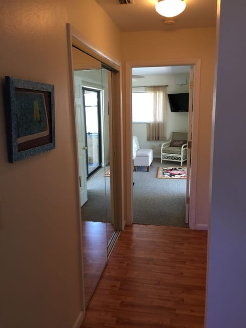 Back hallway to quiet master bedroom, private entrance to lanai with pool & tub.