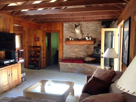 Cozy, spacious open beam living room