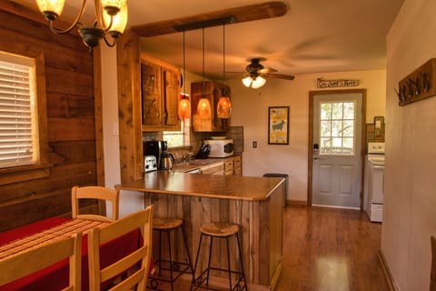 Before pic: Dining table & breakfast bar seat 8. Room for lots more outside too.