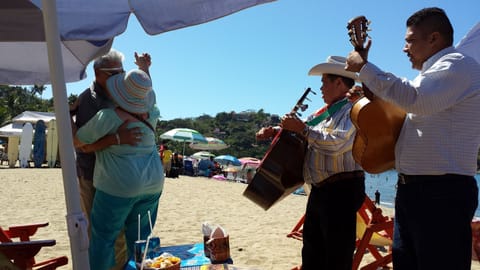 On the beach, sun loungers, beach towels