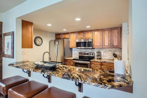 Bar eating area and kitchen.