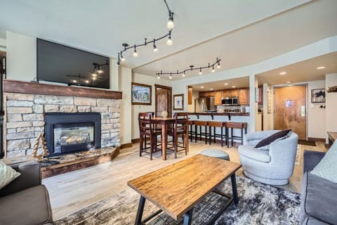 Enjoy the warm fireplace and watch the big screen.