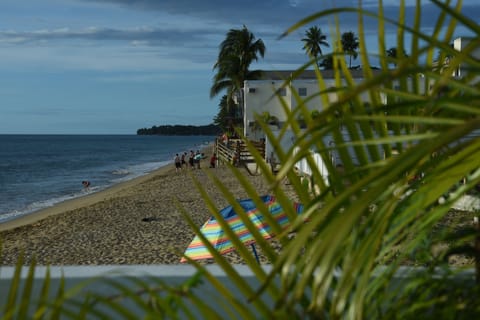 On the beach, sun loungers, beach towels