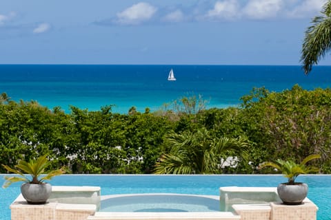 Outdoor pool, an infinity pool, sun loungers