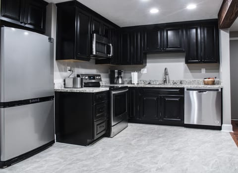 Kitchen stocked with basic cooking necessities.