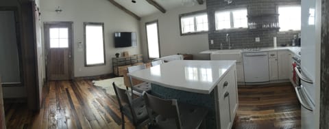 panorama view of kitchen/living & dining
