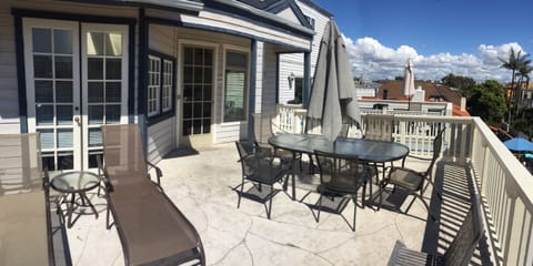 Private deck area with grill. Umbrella table seats 8.