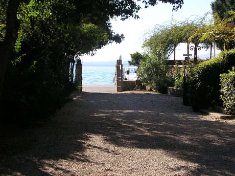 The entrance gate and the garden at ground level