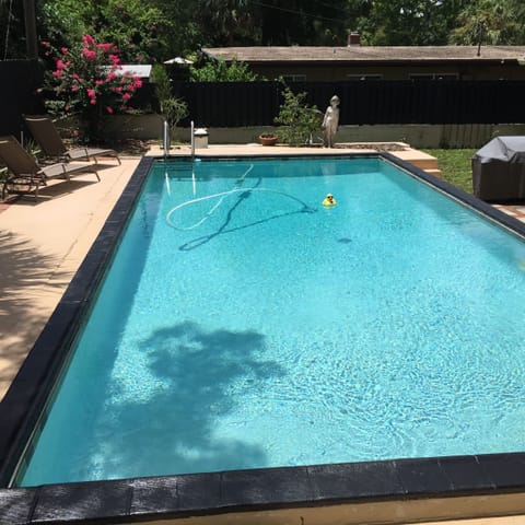 Full size lap pool well maintained. 6 ft privacy fence complete seclusion.