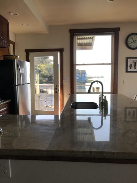 view of kitchen and front door