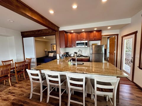 Full kitchen, propane gas stove & oven, toaster, microwave, coffee, tea & more!