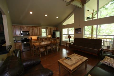 There is a queen sleeper/sofa and a queen futon in the greatroom.