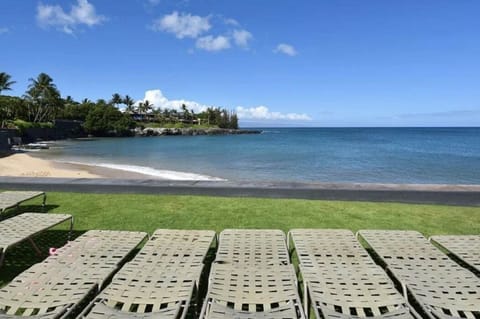 On the beach, sun loungers, beach towels