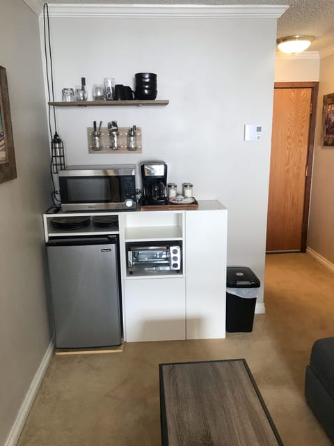 Fridge, microwave, coffee/tea maker, toaster