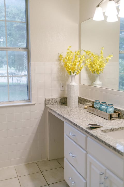 Combined shower/tub, hair dryer, towels, toilet paper