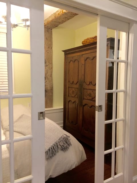 Armoire in bedroom, beautiful exposed beams