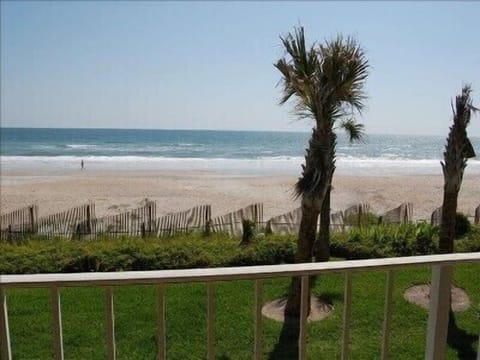 On the beach, sun loungers, beach towels