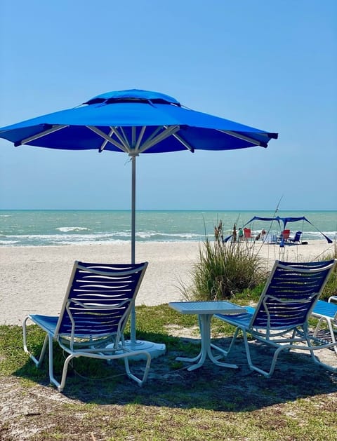 On the beach, sun loungers, beach towels