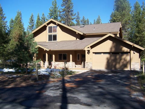 Paved and lighted driveway with a 2 car garage