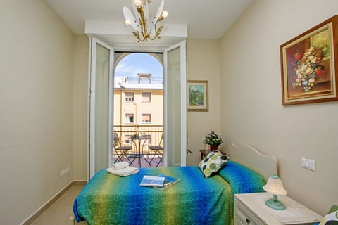 Second bedroom with balcony view