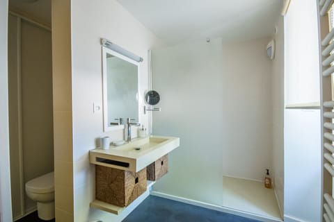 Combined shower/tub, hair dryer, towels, soap