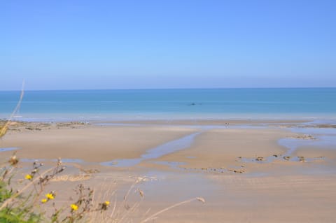 On the beach, sun loungers