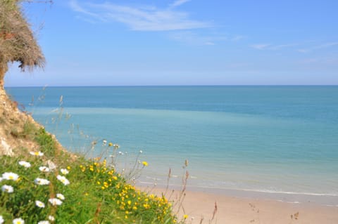 On the beach, sun loungers