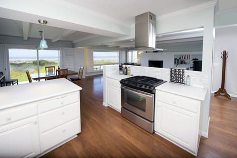 The kitchen includes high end appliances and a gas stove. Views!