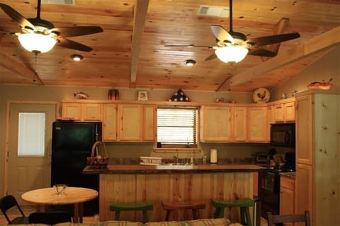 Bar/Kitchen Area - Fully furnished kitchen with stunning walnut bar top!