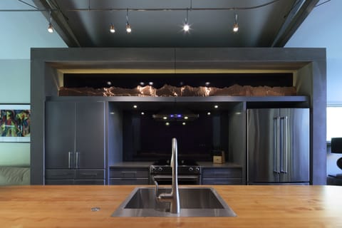 Galley Kitchen w/ large butcher block island