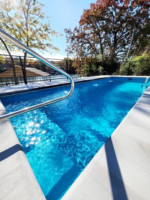 Perfect year around pool lake side with amazing views! 