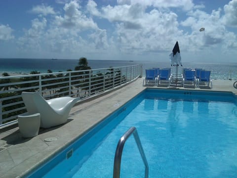 A rooftop pool, a heated pool