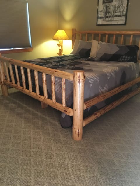 Main floor comfortable king size bed with high quality bedding/
bath across hall