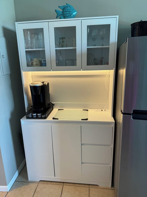 Fridge, microwave, stovetop, coffee/tea maker