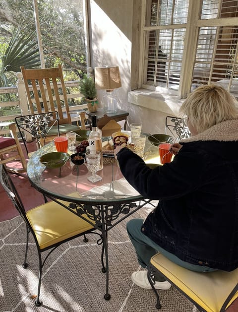 Enjoying lunch on the screened in porch