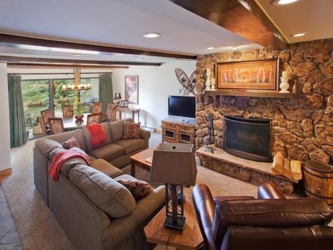 Beautiful living room with wood burning fireplace.