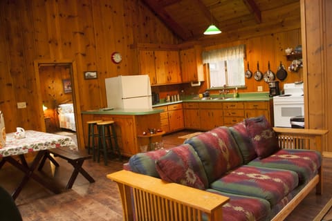 From living area facing kitchen, dining, and bedroom.