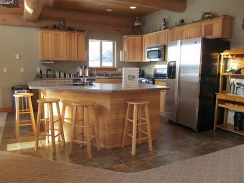 Fully Furnished Kitchen with Stainless Steel Appliances