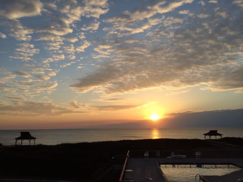 Sunrise over the Atlantic from your own private beach front balcony.