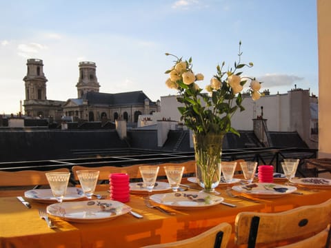 Terrace View to St Sulpice - 5th Floor (dining table fitting up to 10 guests)