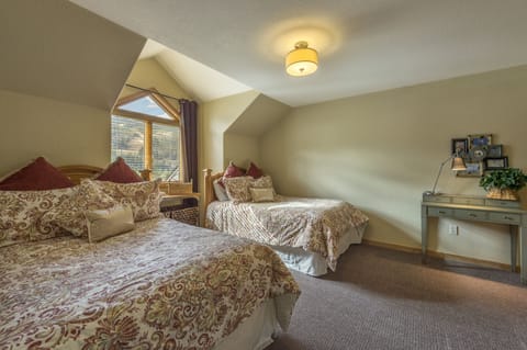 Bedroom 3 (Two Double beds; private door to Bath 3; ski run view)