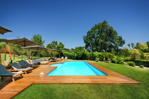 Outdoor pool, an infinity pool, sun loungers