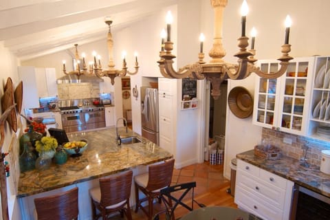 Why do people always hang out in the kitchen? That's where the food/drinks are.