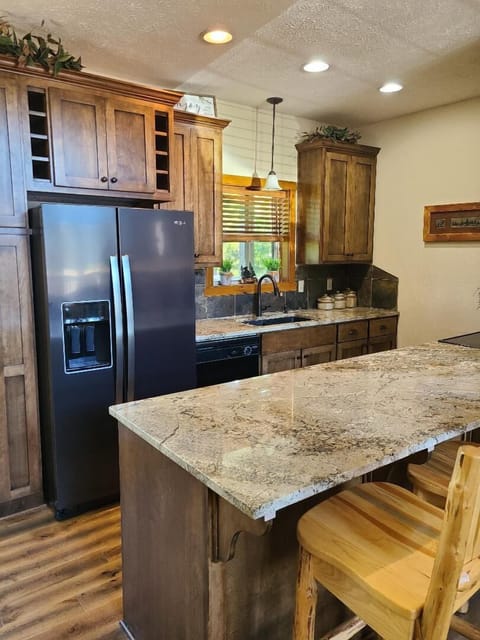 New Kitchen Cabinets, Granite Countertops and Full Size Fridge and Appliances