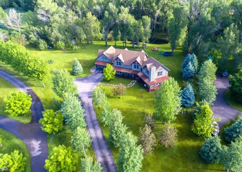 Aerial View of Spring Creek Estate. 2 acres and trout pond and huge flat yard