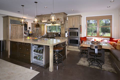 Gourmet Kitchen with SubZero, Thermadore six burner gas range, double oven 
