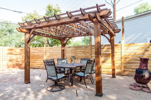 Pergola and outdoor table and seating