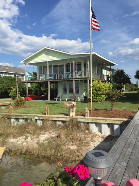 Waterside view of the cottage... great porch overlooking lovely yard & sound.