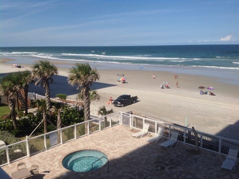 On the beach, sun loungers, beach towels