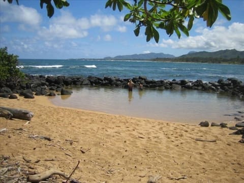 On the beach, sun loungers, beach towels